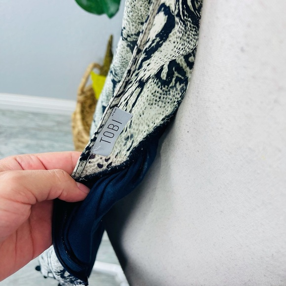 SNAKE PRINT BLUE GREY BELL SLEEVE SHORT POM POM ROMPER - Picture 3 of 7